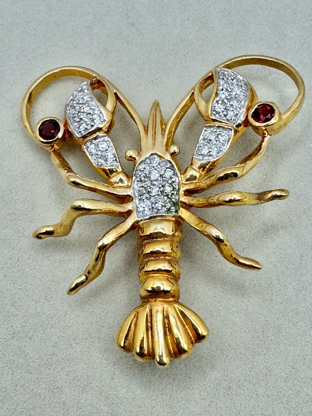 SETA Gold Tone Lobster Brooch with Clear and Red Accents